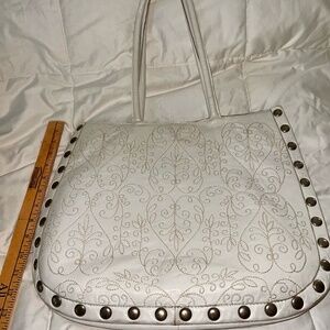 Large white leather satchel. Great for books, papers, pool, or shopping